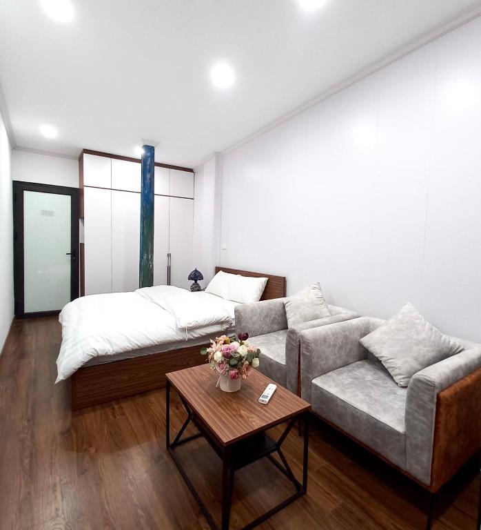 Postel nebo postele na pokoji v ubytování Amelié Homestay