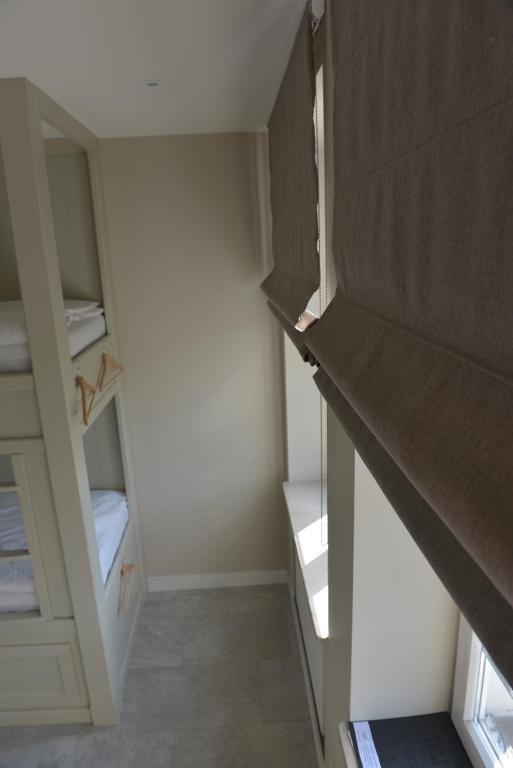 Postel nebo postele na pokoji v ubytování Five Point Hostel & Apartments