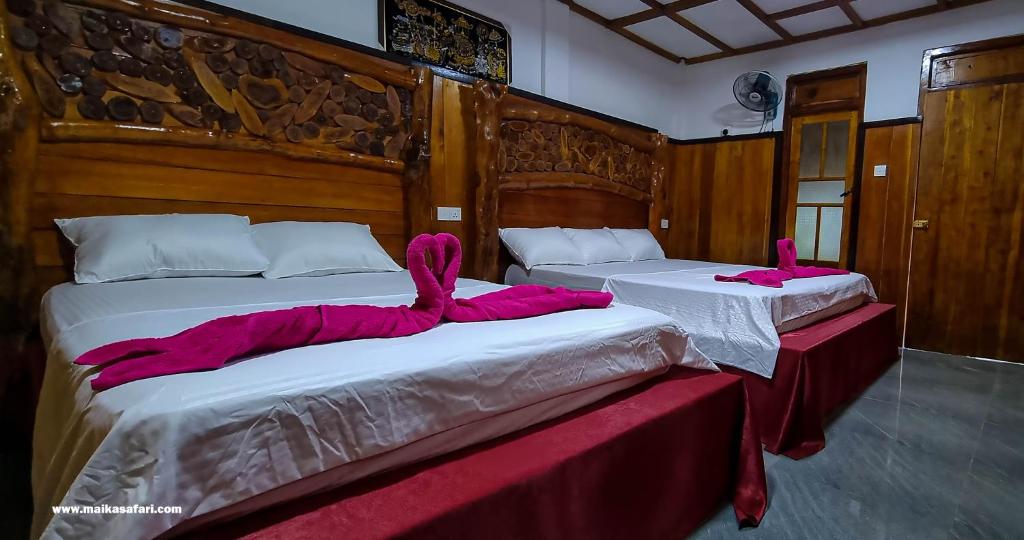 Postel nebo postele na pokoji v ubytování Maika safari lodge