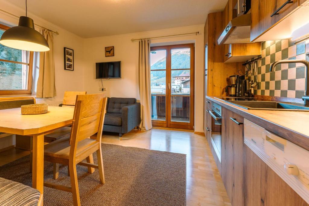 Kuchyň nebo kuchyňský kout v ubytování Bidner, Appartements