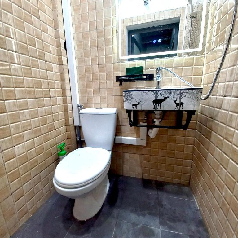 Koupelna v ubytování Amelié Homestay