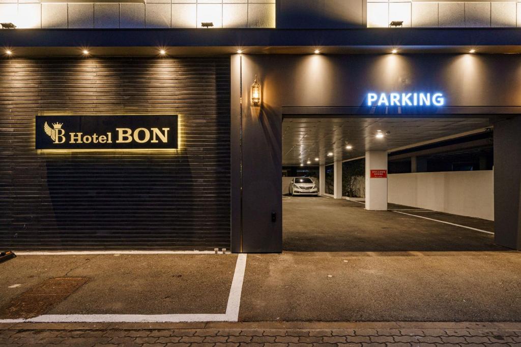an entrance to a hotel room with a parking garage at Hotel Bon in Tongyeong