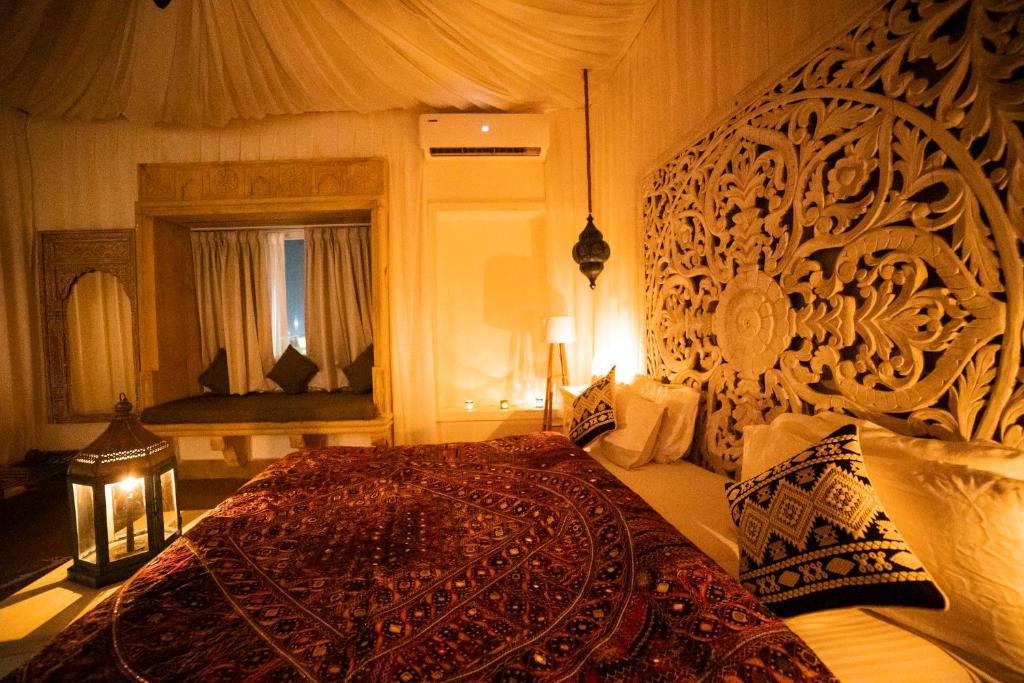 Postel nebo postele na pokoji v ubytování Casa De Kaku Jaisalmer