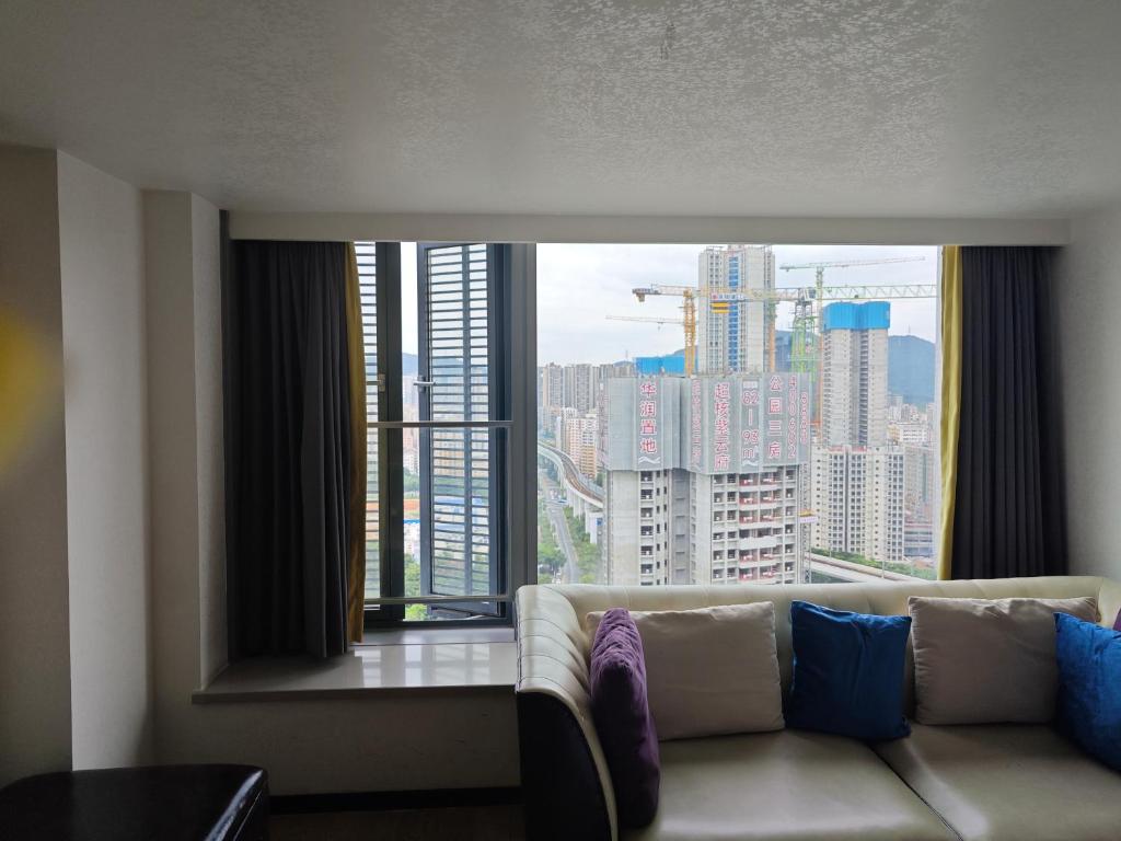 Posezení v ubytování Xinghe Times Apartment - Shenzhen North Railway Station