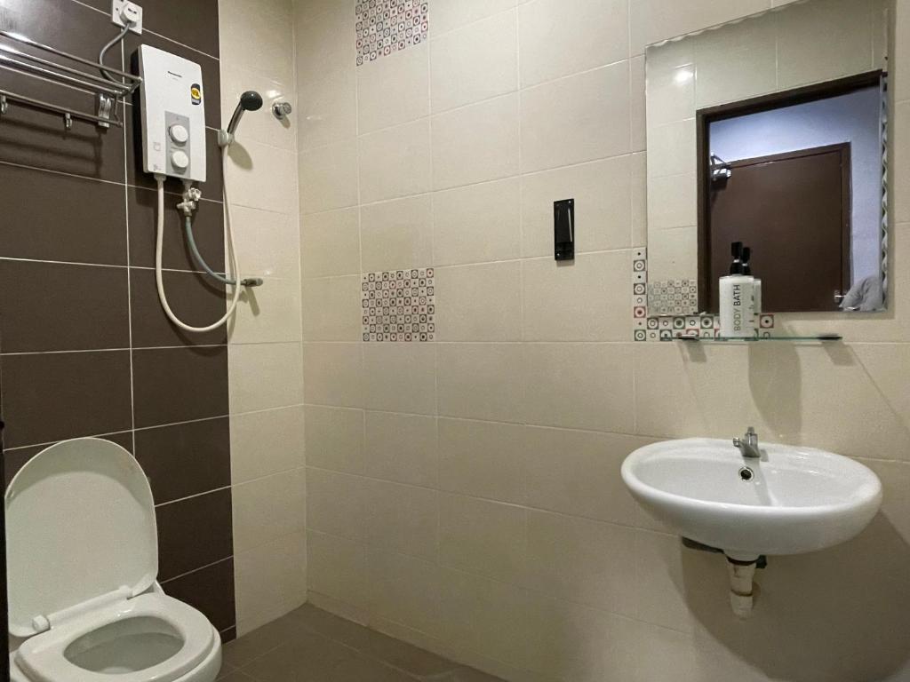 Koupelna v ubytování M Three Hotel by SECOMS