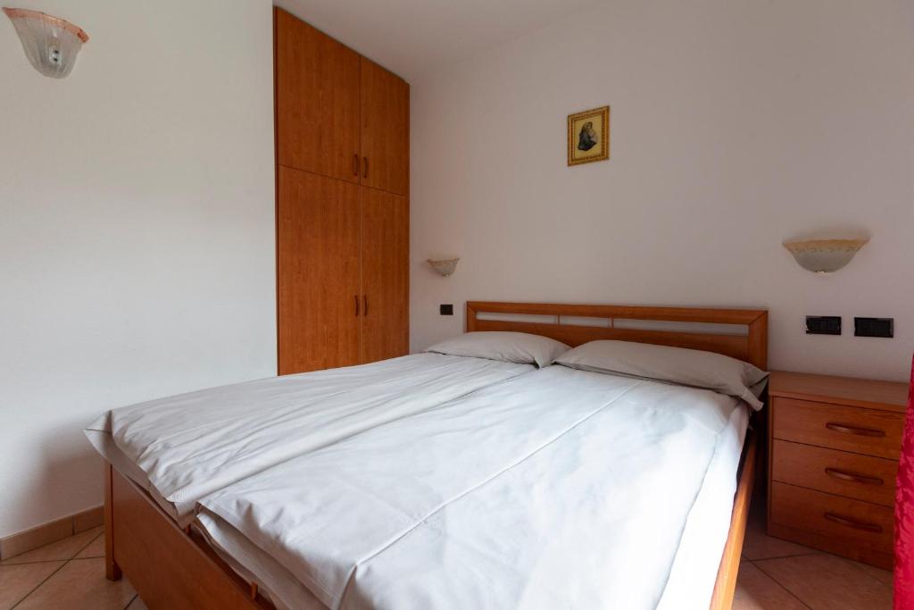 Postel nebo postele na pokoji v ubytování Appartamenti Brunnlein