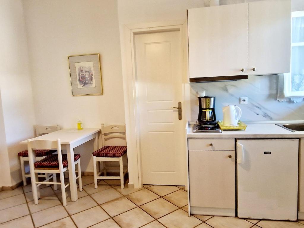 Kuchyňa alebo kuchynka v ubytovaní Panorama Apartments Fiscardo