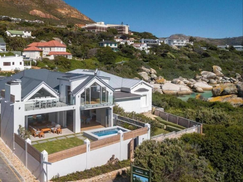 an aerial view of a house on a hill at Boulders Beach Villa in Simonʼs Town