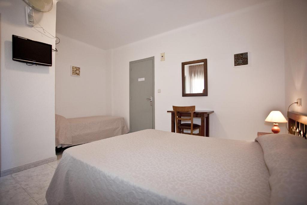 Postel nebo postele na pokoji v ubytování Hotel Beri