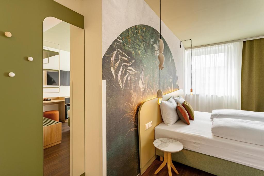Postelja oz. postelje v sobi nastanitve The Weekend Hotel