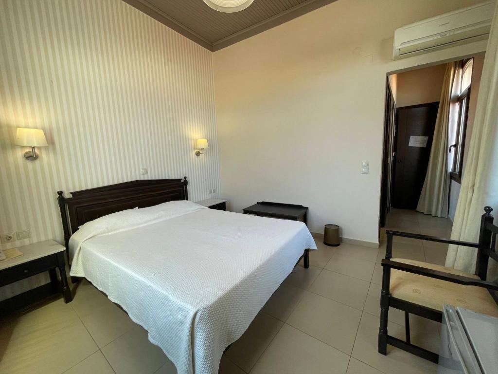 Postel nebo postele na pokoji v ubytování Fortezza Hotel