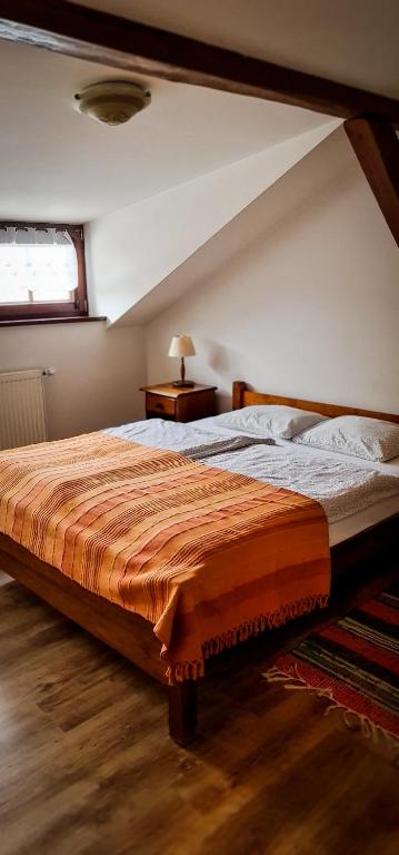 Posteľ alebo postele v izbe v ubytovaní Gościniec Gryszczeniówka & SPA