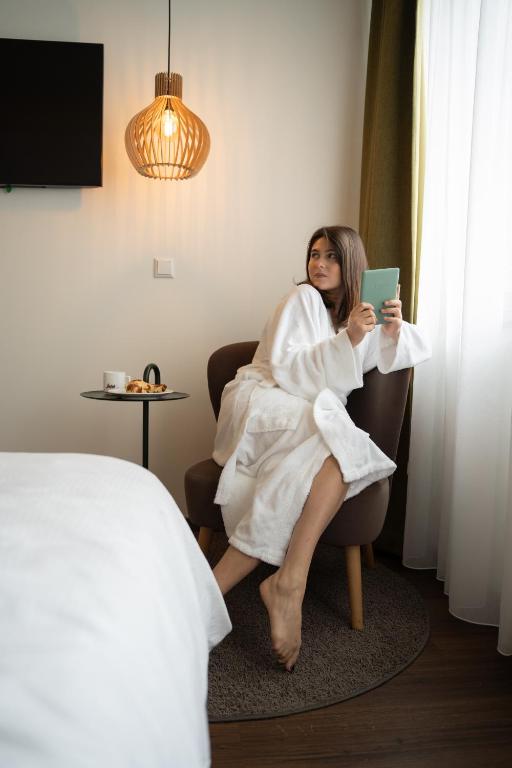 Postelja oz. postelje v sobi nastanitve The Weekend Hotel