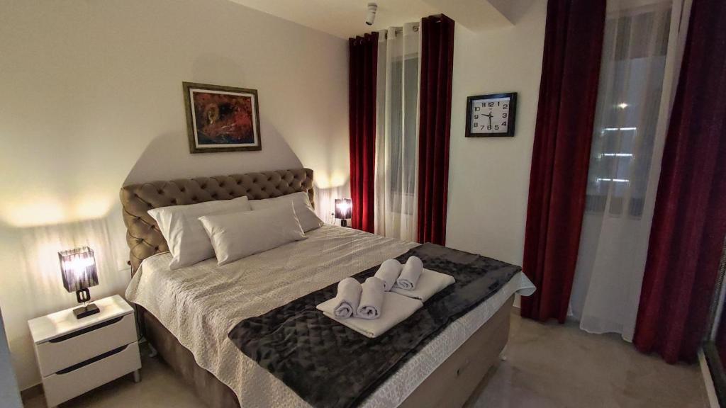 Postel nebo postele na pokoji v ubytování Lux Apartman Crnjanski IV, Jagodina