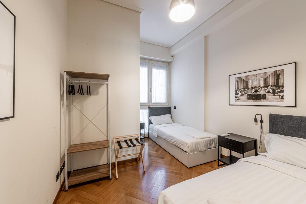 A bed or beds in a room at Ca' Magenta