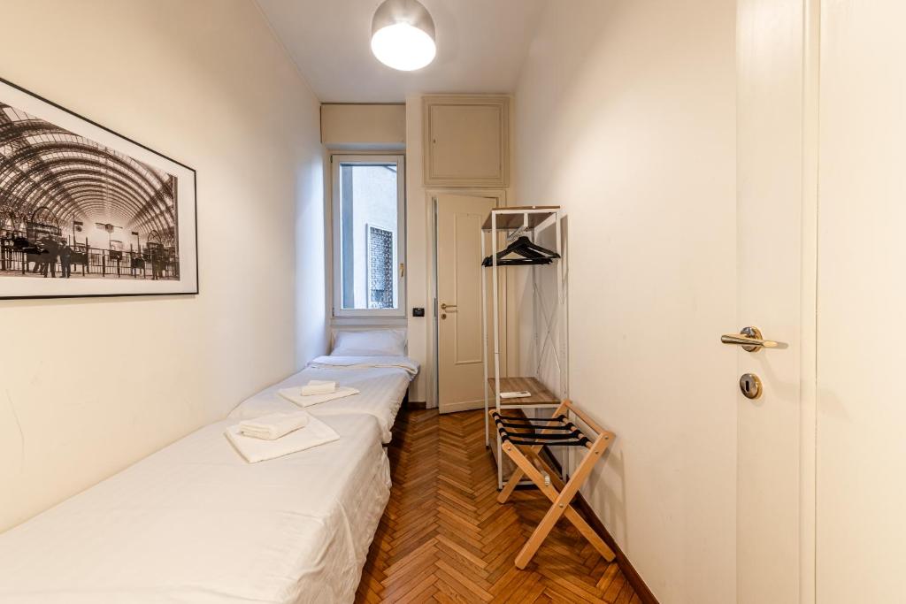 A bed or beds in a room at Ca' Magenta