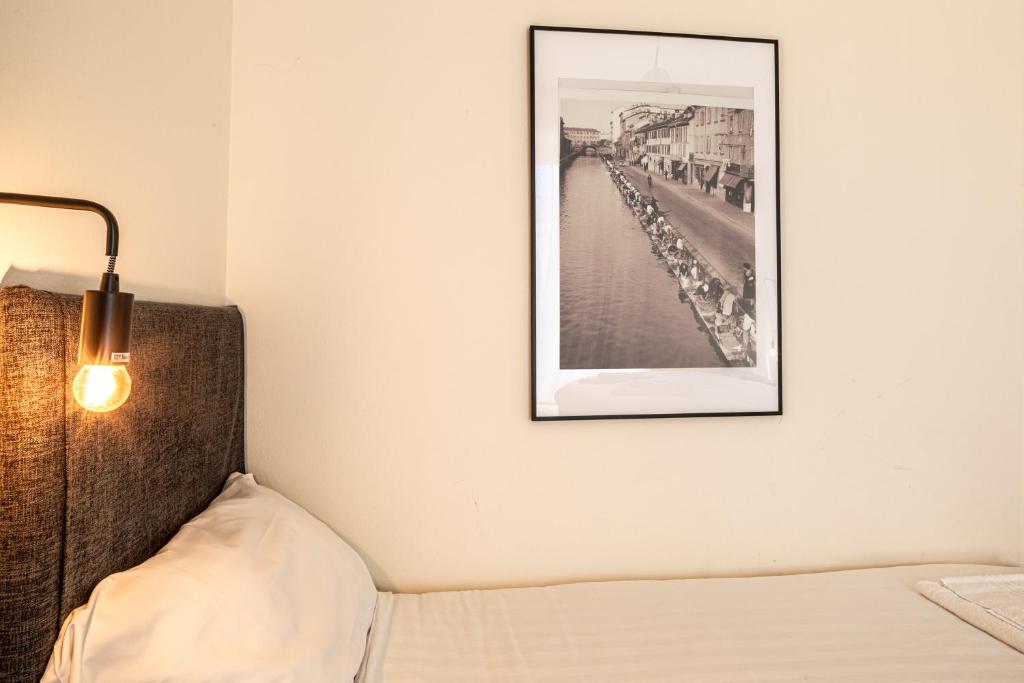 A bed or beds in a room at Ca' Magenta