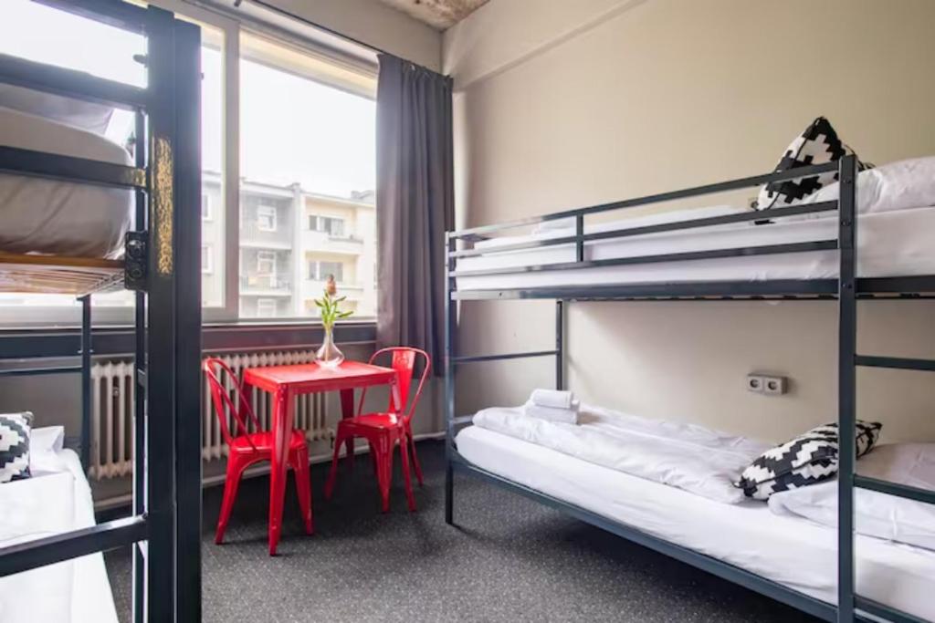 Postel nebo postele na pokoji v ubytování WALLYARD Stay