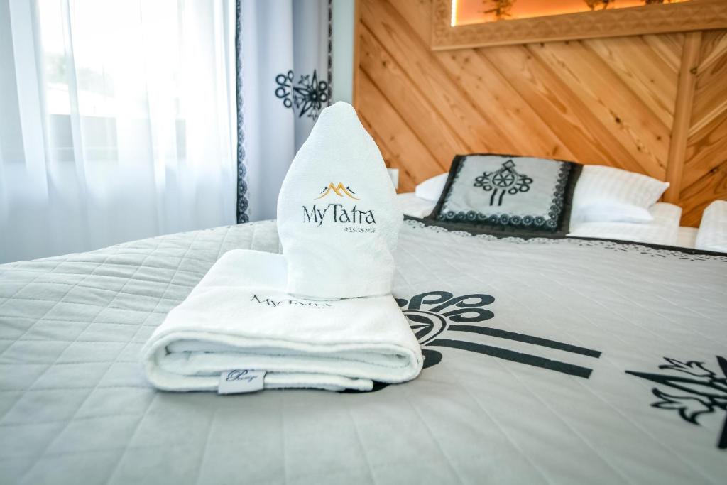 Posteľ alebo postele v izbe v ubytovaní My Tatra Residence