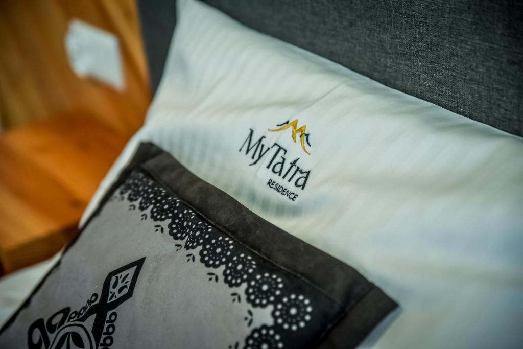 Posteľ alebo postele v izbe v ubytovaní My Tatra Residence