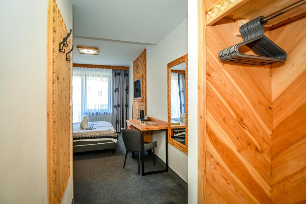 Posteľ alebo postele v izbe v ubytovaní My Tatra Residence