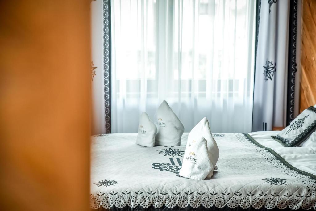 Posteľ alebo postele v izbe v ubytovaní My Tatra Residence