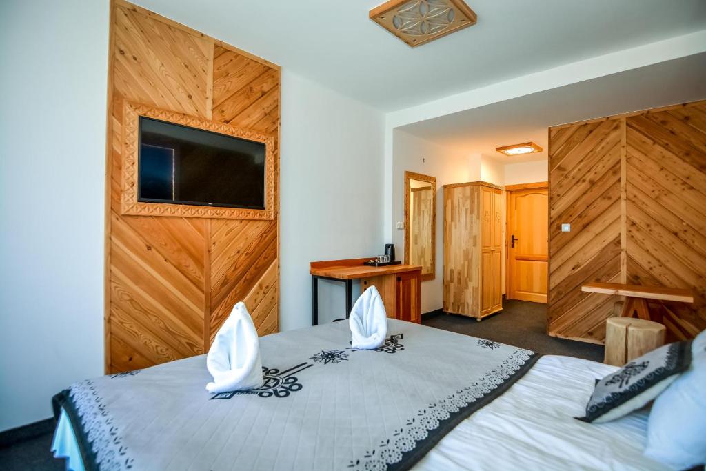 Posteľ alebo postele v izbe v ubytovaní My Tatra Residence