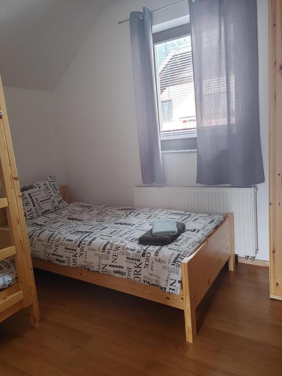 Postel nebo postele na pokoji v ubytování Apartma Katja