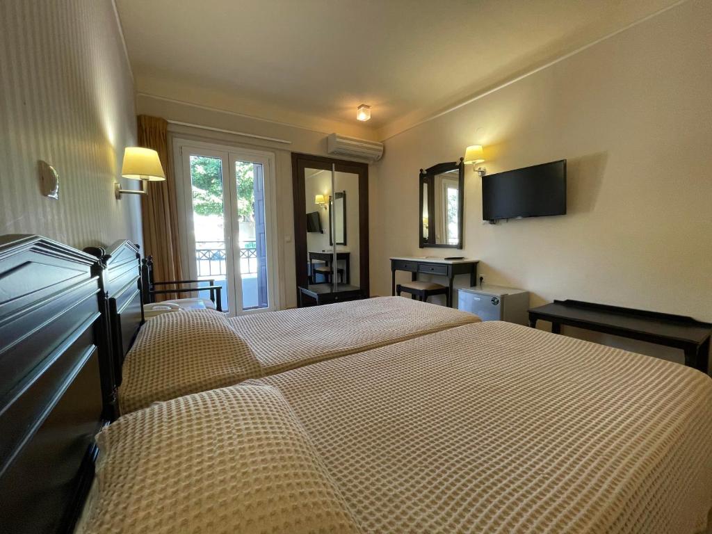 Postel nebo postele na pokoji v ubytování Fortezza Hotel