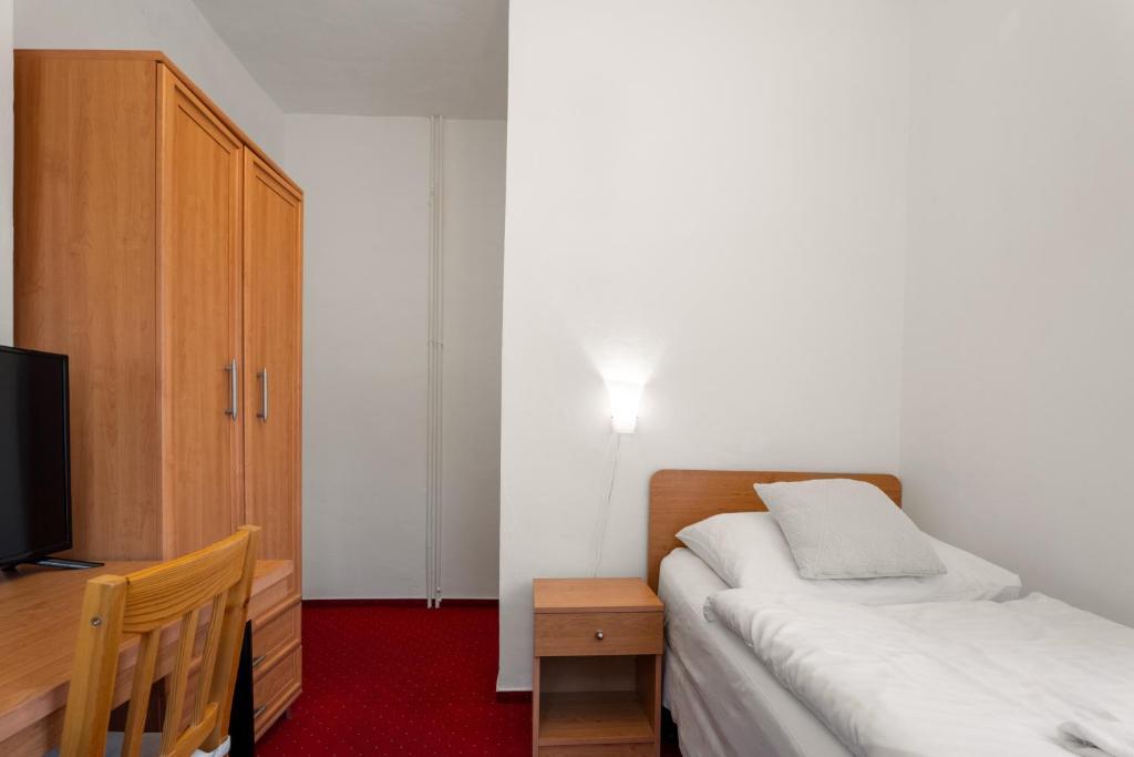 Postel nebo postele na pokoji v ubytování Vila Charleston