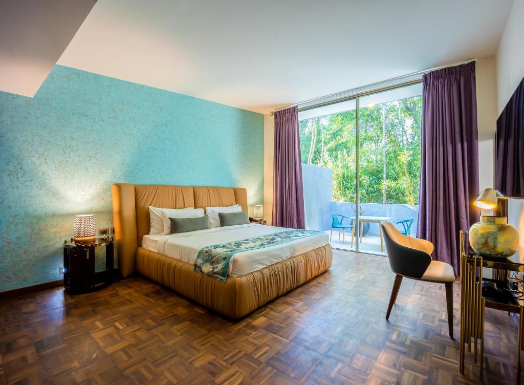 Voodi või voodid majutusasutuse Java Rain Resort toas