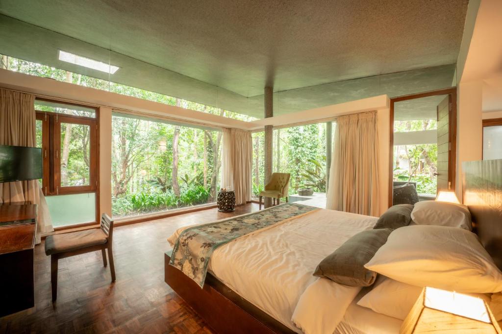 Voodi või voodid majutusasutuse Java Rain Resort toas