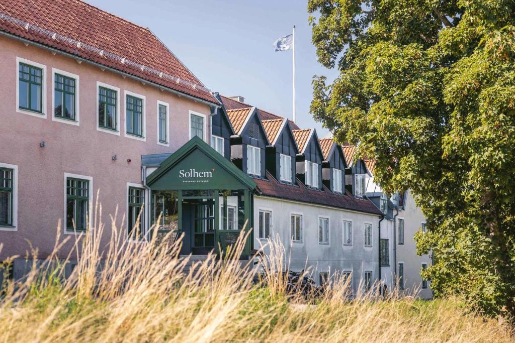a building with a sign that saysstudent in front of it at Best Western Solhem Hotel in Visby