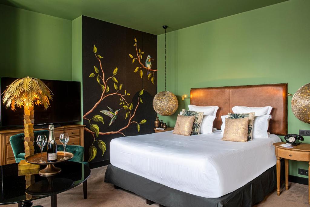 Postel nebo postele na pokoji v ubytování Les Maisons de Léa & Spa - Radisson Individuals