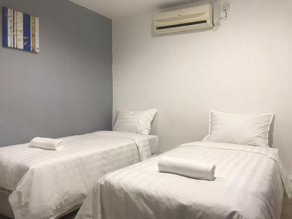 Postel nebo postele na pokoji v ubytování Hotel Seroja