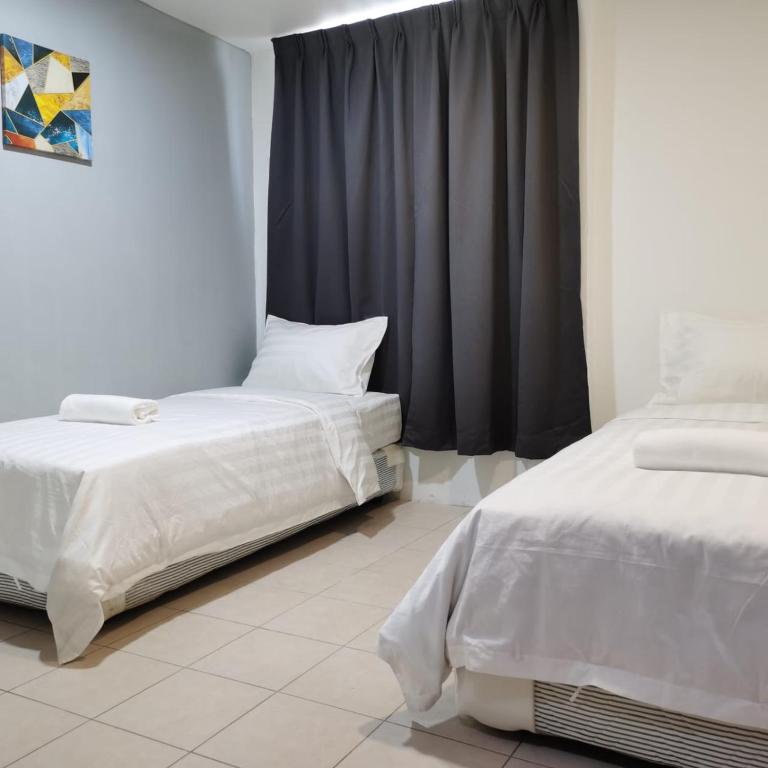Postel nebo postele na pokoji v ubytování Hotel Seroja