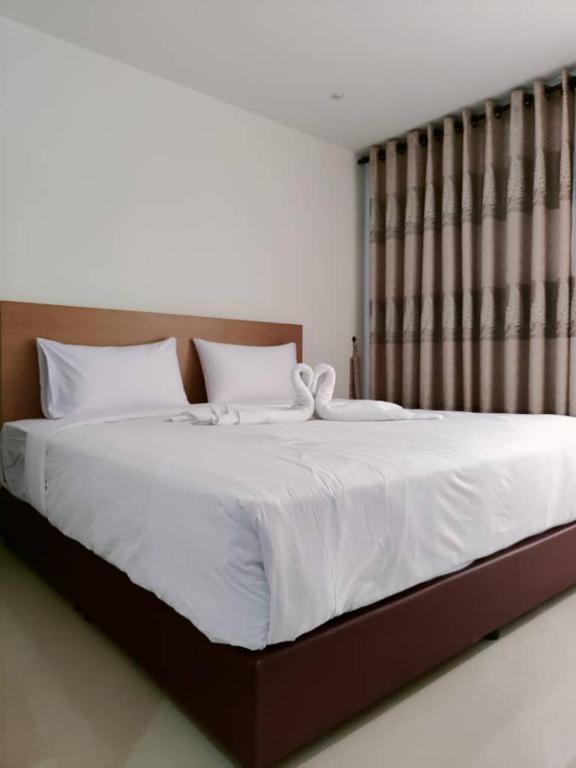 Postel nebo postele na pokoji v ubytování One Dream Hotel
