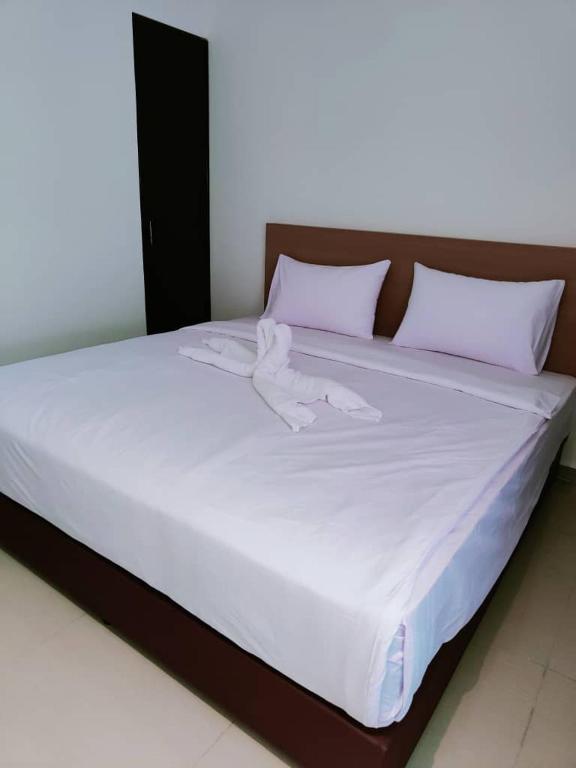 Postel nebo postele na pokoji v ubytování One Dream Hotel