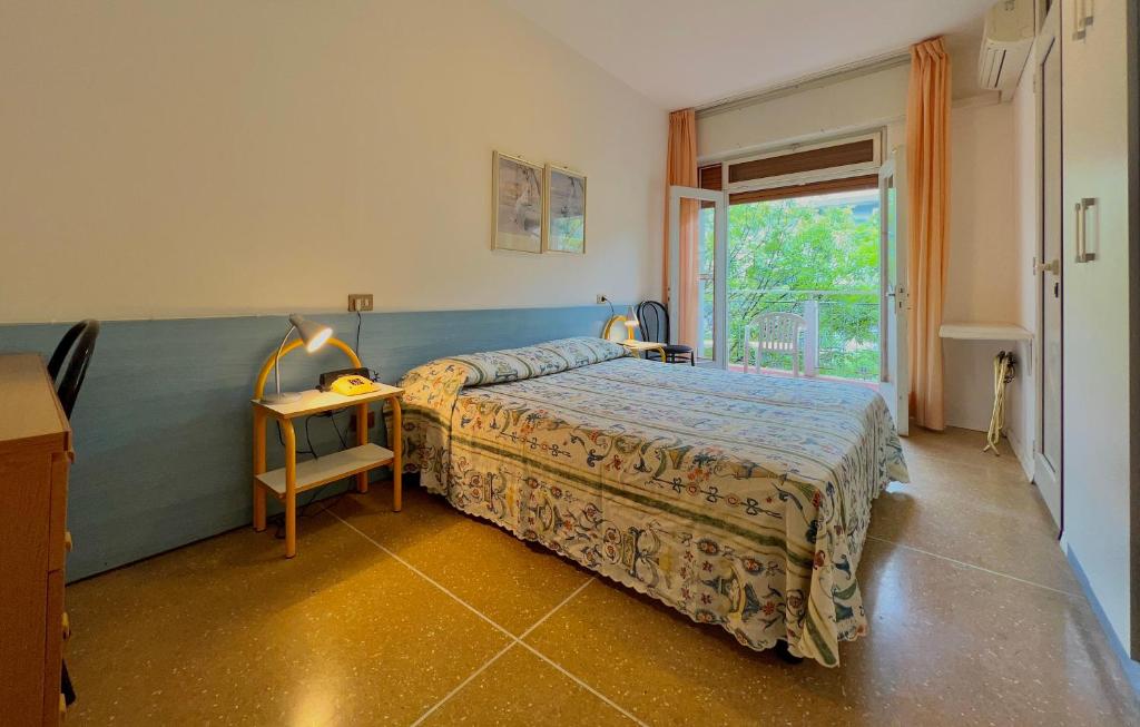 Postel nebo postele na pokoji v ubytování Hotel Myriam