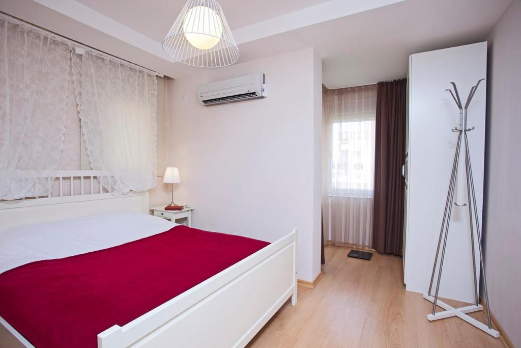 Postel nebo postele na pokoji v ubytování The Room Hotel & Apartments