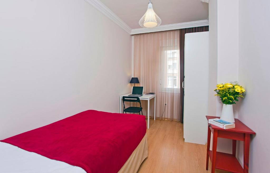 Postel nebo postele na pokoji v ubytování The Room Hotel & Apartments