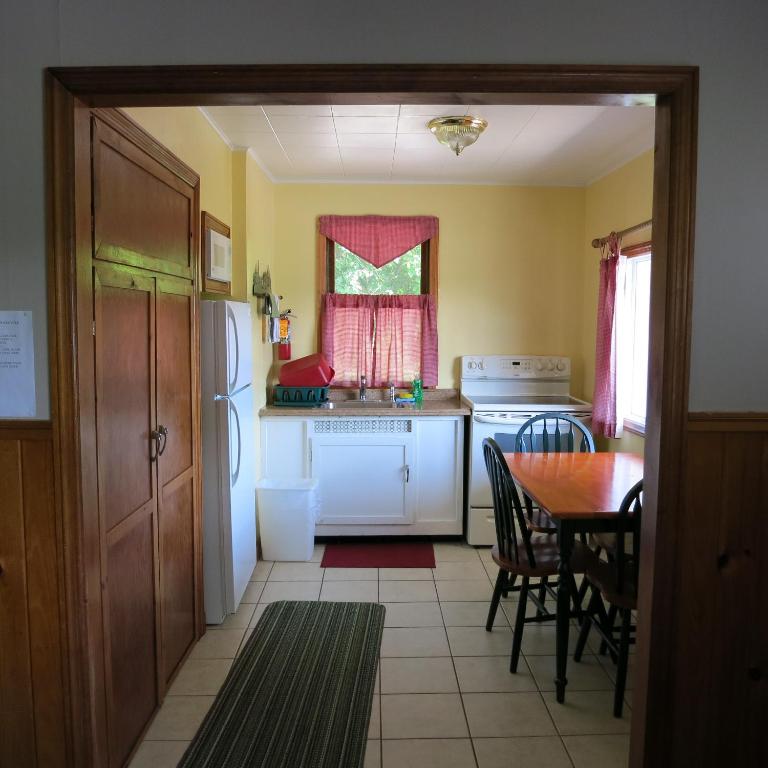 Postel nebo postele na pokoji v ubytování The Austin Inn