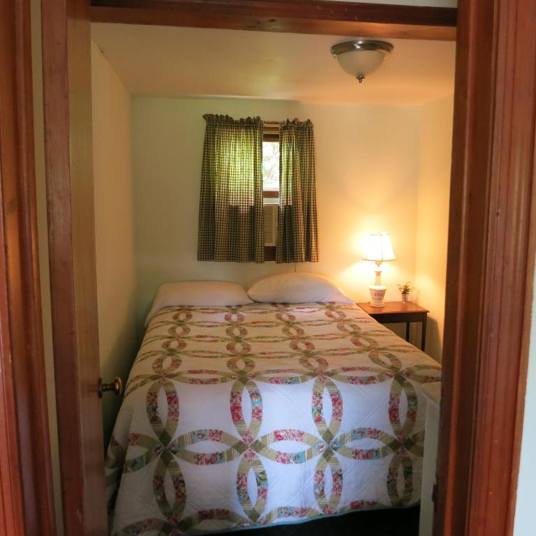Postel nebo postele na pokoji v ubytování The Austin Inn