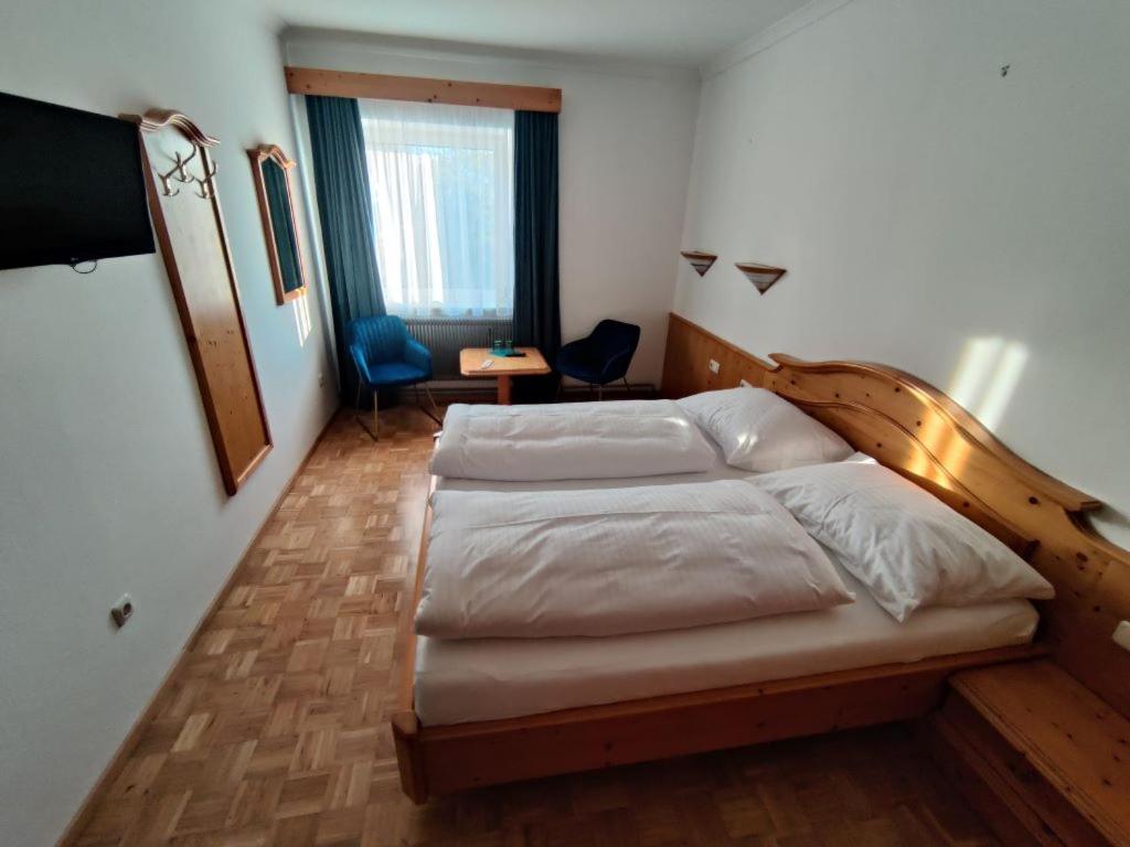 Postel nebo postele na pokoji v ubytování Neuhof