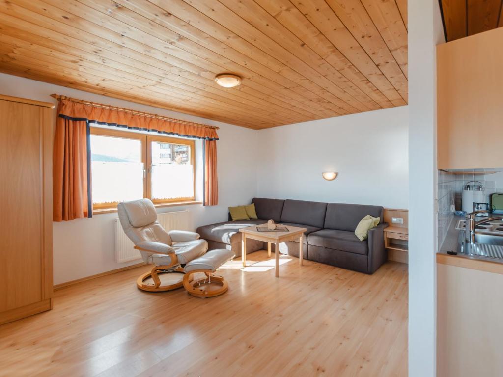 A seating area at Apartment Voithofer-7 by Interhome