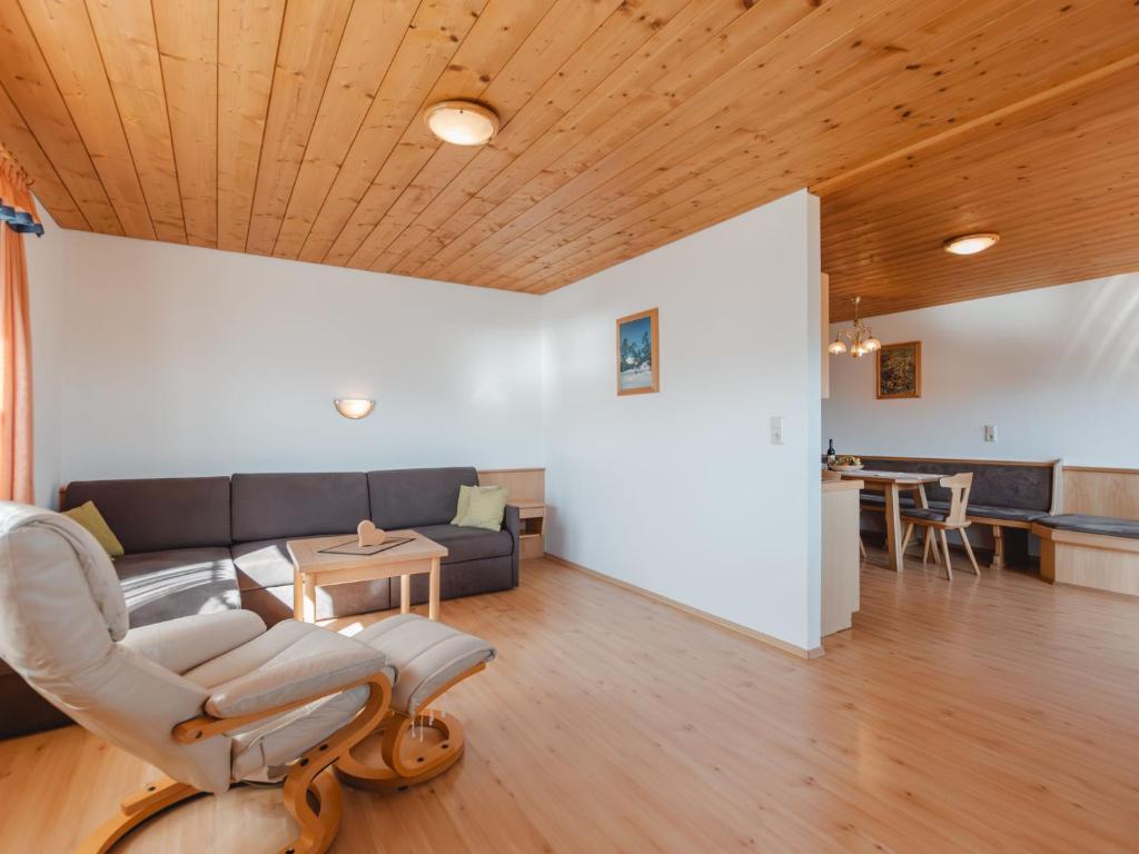 A seating area at Apartment Voithofer-7 by Interhome