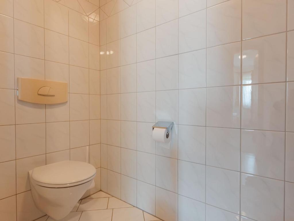 A bathroom at Apartment Voithofer-7 by Interhome