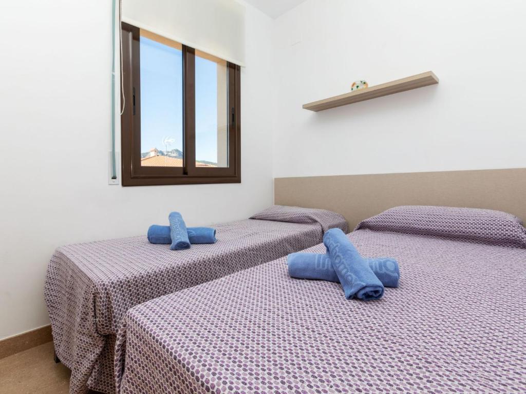 Posteľ alebo postele v izbe v ubytovaní Holiday Home Paloma 2-3 by Interhome