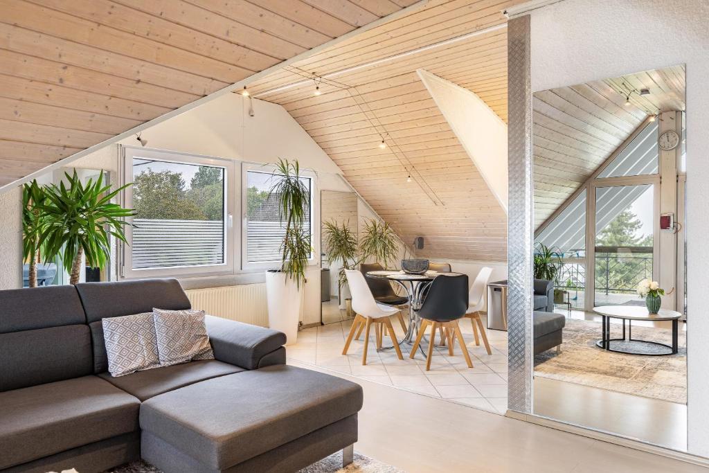 a living room with a couch and a table at Ferienwohnung Christine 