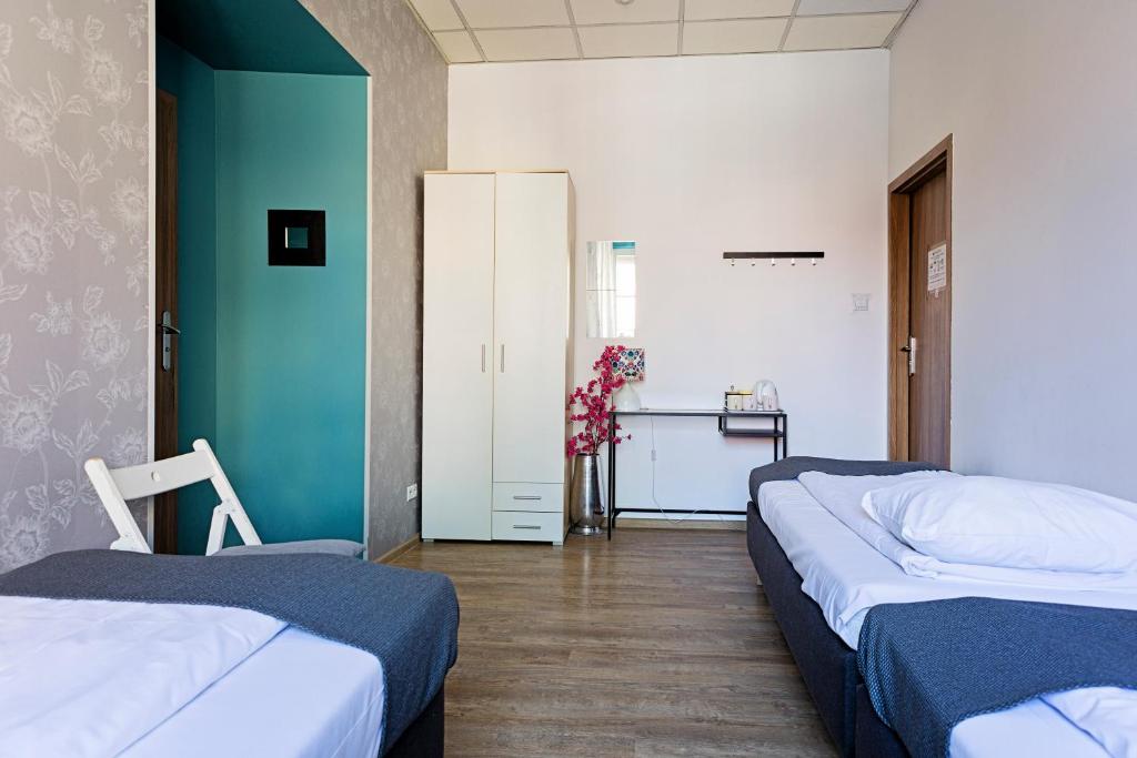 Posteľ alebo postele v izbe v ubytovaní Folk Hostel